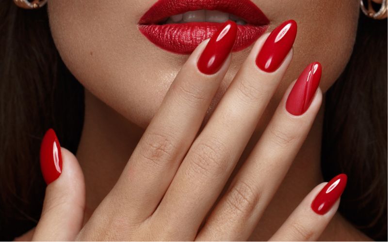 Hailey Bieber's Lipstick-Red Nails